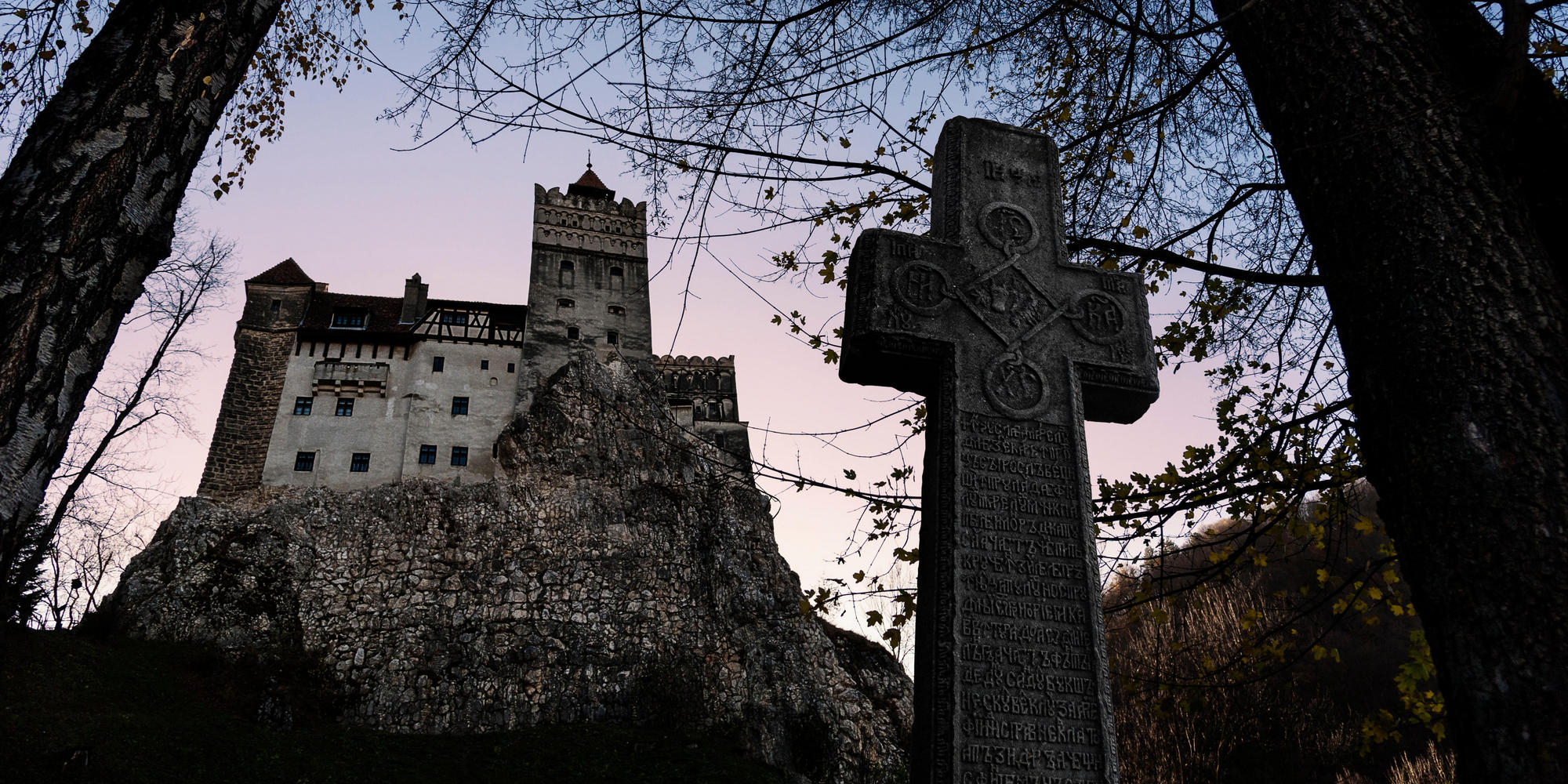 Bran Castle Museum (Dracula's Castle), near Brasov, Transylvania, Romania. Famously known as the Castle of Dracula. Exterior view at sunset